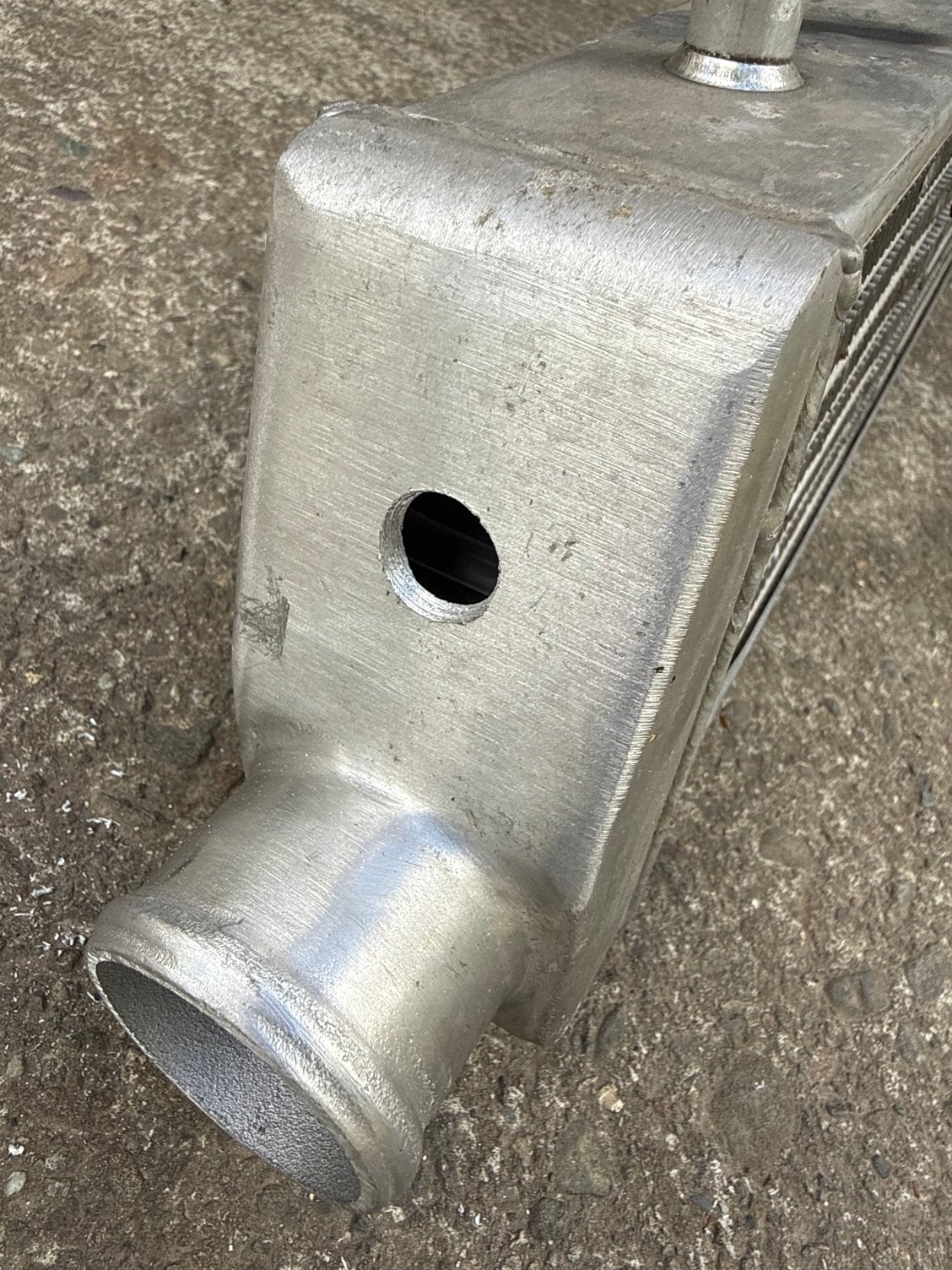 Drilled a hole for the IAT sensor. 