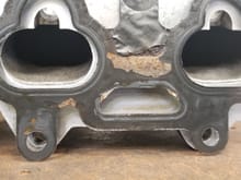 Though the gasket has holes for both water ports, both USDM NA6 and JDM NB6 intake manifolds have the trapezoidal water port blocked.