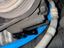 Roughly the angle of attack the hose would come down through the engine bay. 