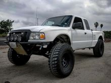 This is the truck, still have her for now until gas gets a bit more expensive then I'll probably sell, has a lot done including a diff geared rear end, spare tire setup in the back, exhuast,  35 inch Kevlar reinforced wheels etc. It's great and all but 10mpg has been pretty bad 