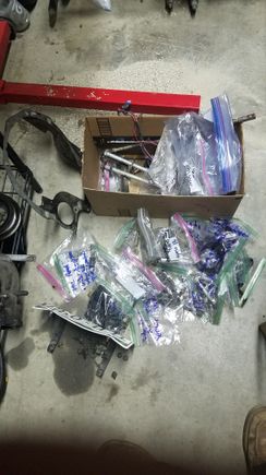 Box of bolts from the motor swap and extras