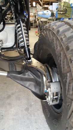 All the brakes and the POWAH are out back.  Those giant rear tires are just for the trailer.  Larger diameter paddles that are too wide for the trailer are fitted at Glamis.