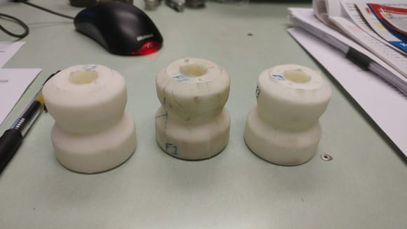 On to coilovers:  Here's 3 urethane bumpstops I cast to get the desired results.  I knew what I wanted in terms of force/displacement and thought it might be fun to 3D print a mold and cast them myself.  Works well.