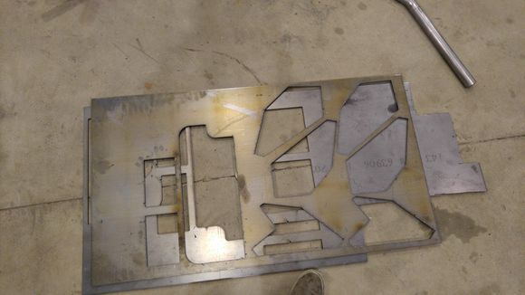 Plasma cut some 0.25" plates out for the mounting plates, rear sub/shock tower bracing, and front tower bracing. Only ~ 0.080" is required, but our data proved thicker plates would eliminate some of the tower flex in the front after removing the wheel wells completely.