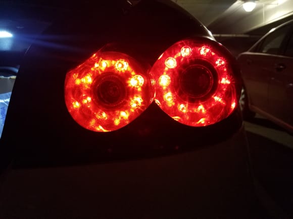 My factory taillights with GTR overlay cutout. 