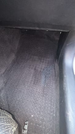 Passenger floor carpet wet, below carpet puddles up 