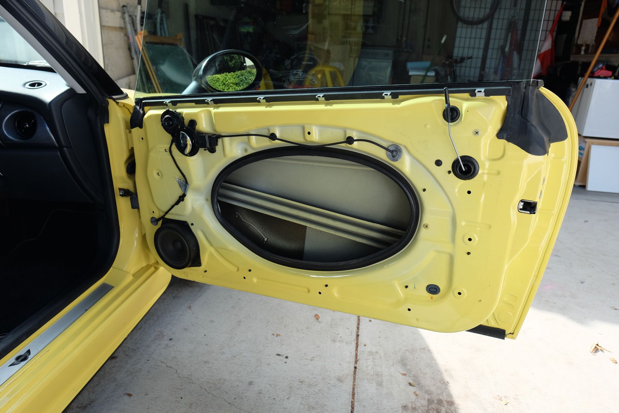 Car door light install for the R53 North American Motoring