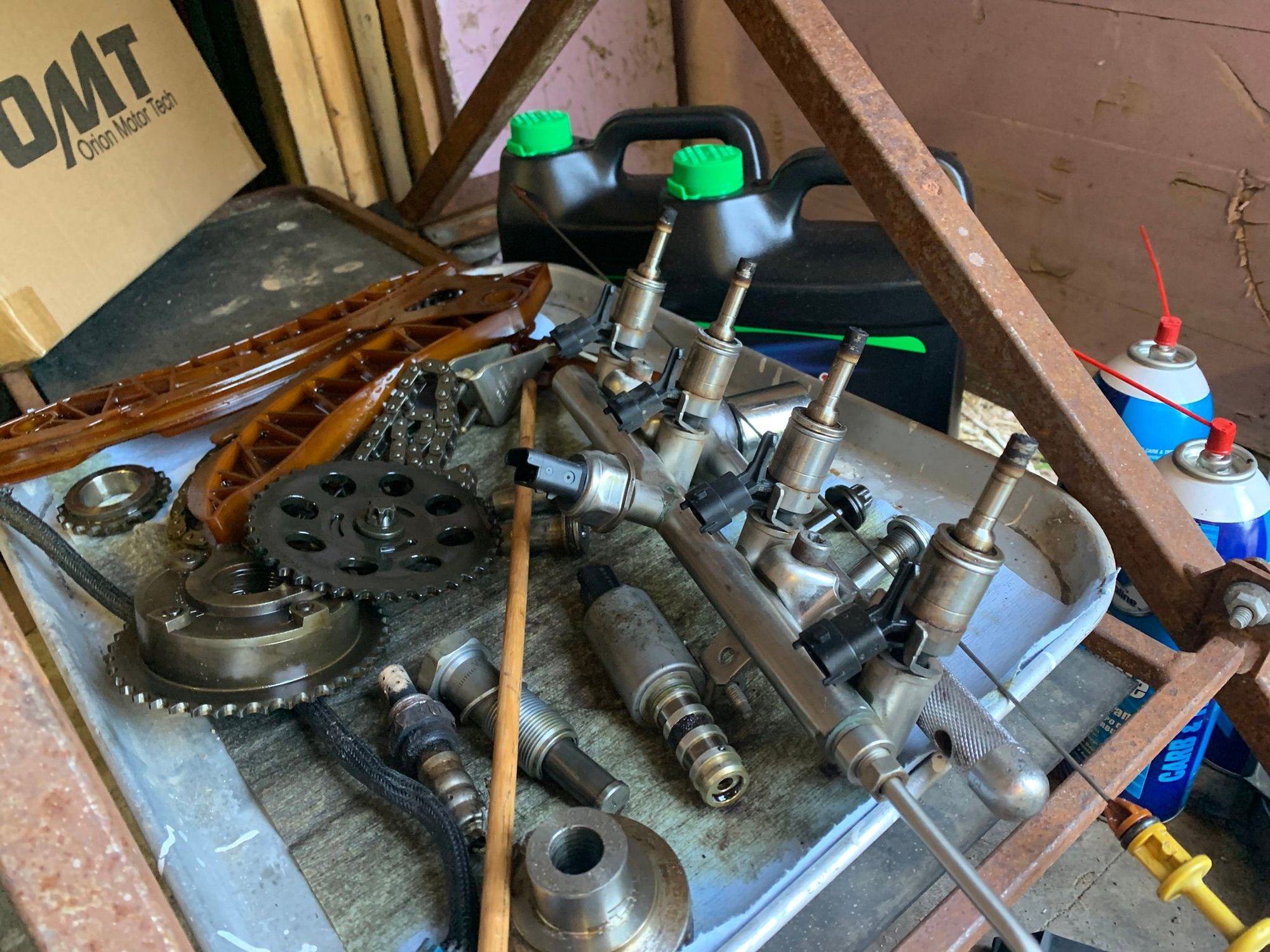Fuel injectors before cleaning with wire brush and carb cleaner
