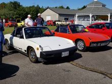 My white '75 next to a really nicely preserved/restored '74 in Signal Orange