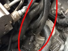 About this vacuum line, is it suppose to go over or under? Because the line connecting the to vacuum pump seems very tense. I've been trying to find photos of it but I don't see any for this part