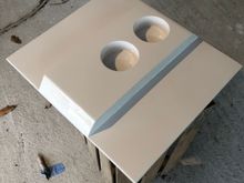 Flip down Center arm rest. The sides will get vinyl shaped like the center piece and the backside will become a small third seat when fliped up