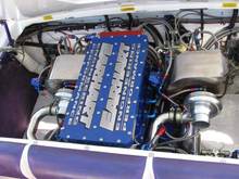 I used water cooled heat shields to control the temp under the engine hatch. 