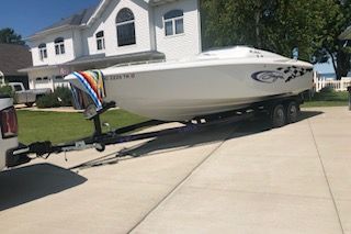 Here’s a pic of boat. Haven’t really ever saw another outlaw before besides the 40’ that was for sale with same graphics. The all seem to have the colored stripe up to bow. 