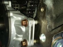 Installing oil pump with spacers to clear the double chain