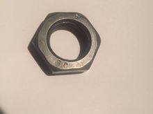 It looks more like a tie rod jam nut than an o2 sensor bung