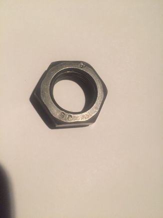 It looks more like a tie rod jam nut than an o2 sensor bung