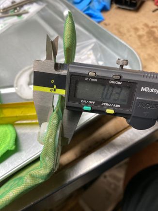 Measuring how far The inlet sock sits off the floor of the bucket