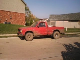 at work after a mud bog the night before. the front tires become ski's with a 2wd truck with a locker. I drove around an International Scout on 35's through the mud pit. I was in 2nd gear. speed said 70mph. 6,500RPMs.