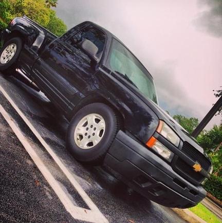 Most recent picture,parked at work, re-did the exhaust with a flowmaster 3' and nascar style side dump! ;D