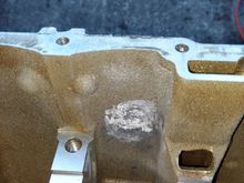 Here is the area after welding it up and grinding it down. All fixed.