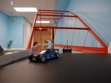 Glass arch bridge from road level.