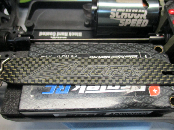 Carbon Fiber battery strap engraved