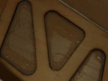 Solid rear spar visible through servo access opening, this is one of two parallel solid birch spars that go from one retract bay to the other bypassing original weakened poplar ply spars