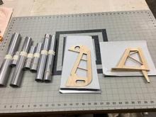 All covering cut to size; much of it rolled back up and labeled.