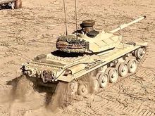 Tamiya Centurion making easy work in silty dirt. 