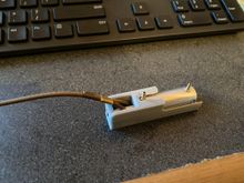 Current idea for the chute release cylinder. This has to still be tied to a bulkhead (preferred) to help take out the loads from the chute. The brown cord is a approx .10" dia stretchable shock cord, that will run to the chute shroud lines.