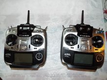 Transmitter on left is in LIKE NEW Condition.
Transmitter on right has been used for 2 seasons and has a broken switch on SB toggle.
