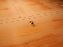 "Bulb" cemented in place in location. Inside top of dowel painted silver for effect. Surrounding wing area under blister painted aluminum.