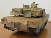 HL Abrams with stock tracks, runs fine.