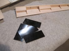 The process starts with four rough cut pieces of plastic laminate.  Bob donated the laminate for this project.   They will become the top and bottom of the RDS pocket.