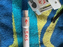 Strut stubs were .014 undersize!  Ideally they should be a TIGHT fit prior to tightening the trunnion clamp bolt.