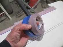 Speaking of masking or painter's tape, did you know that it comes in different adhesive strengths?  The blue tape is the "medium" strength while the purple tape is rated at "delicate".  Using the delicate tape in this application will ensure that when I remove the tape it won't pull off the primer beneath.  