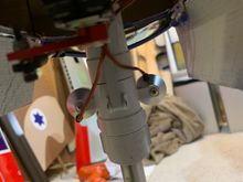 Photo from rear of upper nose strut. I zip tied the 2 landing light wires to rear of strut 