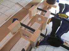 Wood blocks and clamps to hold everything square while the glue dries.