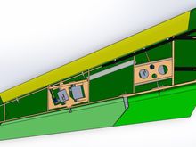 Outboard wing panel (LH side), with the wing upper FG skin removed. Basic setup with a Fwd spar, and a TE closeout spar. servos accessible thru 2 lower covers. Inbd portion of this panel has 2 carbon rods, to pass the load from the Outboard wing to the Aluminum sweep arm on the Inboard wing.