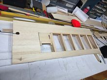 When I remove the servo for covering I'll pull a string through the holes to pull the wires back out.