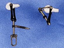 Prototypical Couplers left one has handle to tighten coupler