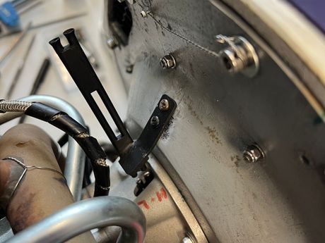 The secret is that the brass tubes (painted black and trumpeted here) pointing EXACTLY to the mixture screws.  Zero misalignment is allowed!