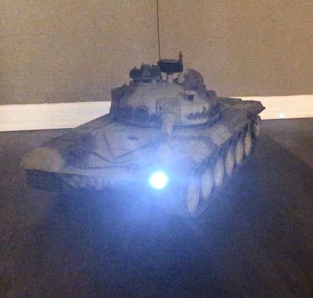 Main gun firing “cannon flash” .