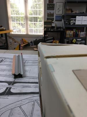 Surprisingly little elbow grease produced a nice radius where the fuselage slabs meet. I was trying for 3/32". What do you think?