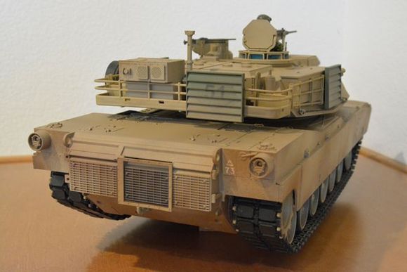 HL Abrams with stock tracks, runs fine.