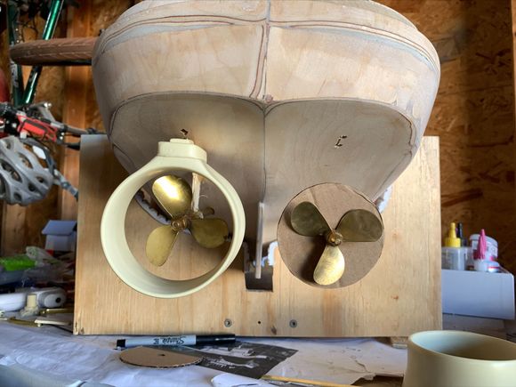 Getting the angles of the Kort Nozzles has been the hardest part.  These are not part of the kit, so I'm approximating all over based on Dumas drawings.  I also used Hot Glue to tack the prop shafts on the outside with leftover wood.  Once I get the Kort Nozzle mounts in place, I plan to solder up the brass support pieces for the prop shafts.