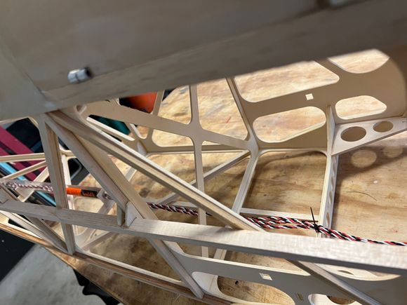 Zip-tied to keep them out of the way for cover.