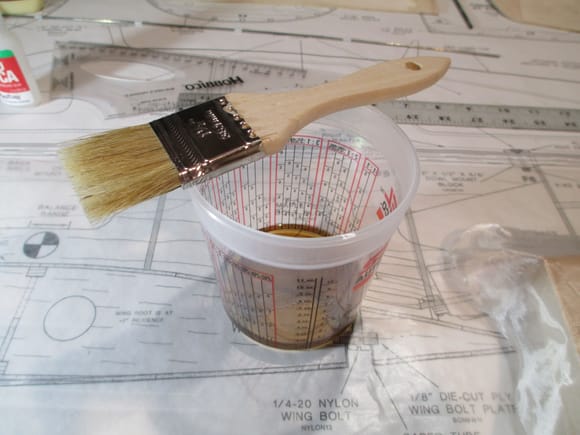 I have a variety of these inexpensive chip brushes to apply the resin.  These can be purchased at your local hardware or Harbor Freight store.  The mix should be very thin, almost like water if you got the ratio right.