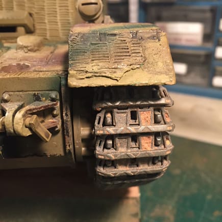 Left side: the worn chevrons on the outside of the tank