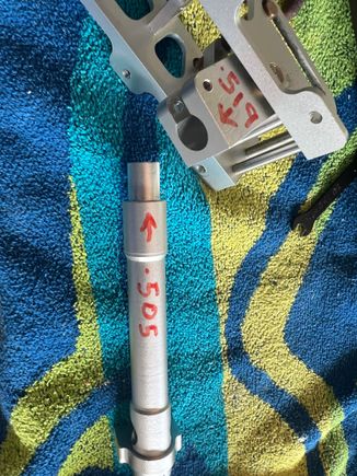 Strut stubs were .014 undersize!  Ideally they should be a TIGHT fit prior to tightening the trunnion clamp bolt.